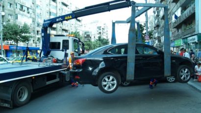 Ridicarea maşinilor parcate neregulamentar a fost suspendată