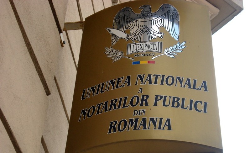 Uniunea Naţională a Notarilor Publici din România propune reducerea cu 50% a onorariului aplicat actelor de dare în plată