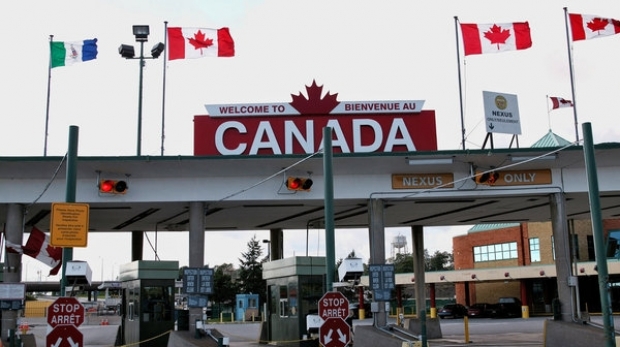 Românii pot merge în Canada fără viză, doar cu paşaport simplu electronic