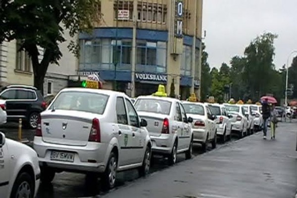 În municipiul Braşov vor circula numai taxiuri cu bulină mov